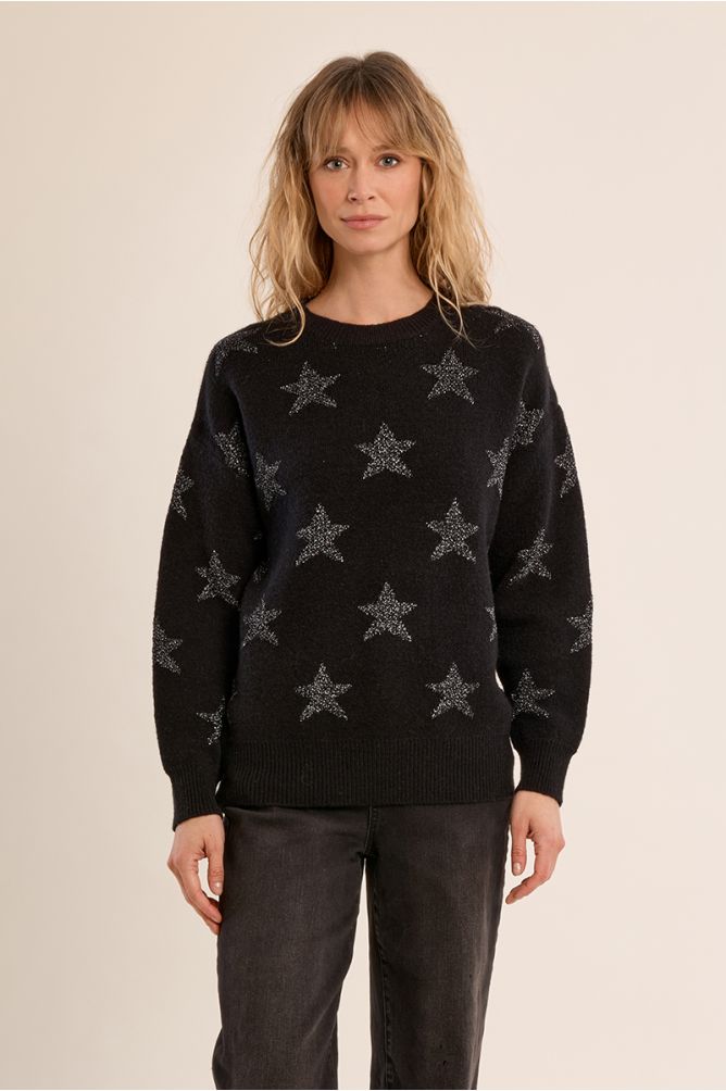     Molly Bracken black iridescent star knit jumper front view on woman