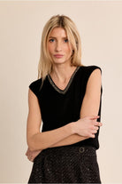 Molly Bracken women’s black sleeveless knit top on model