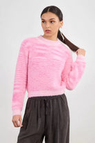 	Women’s relaxed fit pink fuzzy knit sweater with crew neck By Molly Bracken 