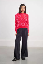 Molly Bracken Red heart motif knit jumper styled with wide leg trousers