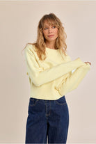 Molly Bracken yellow ribbed jumper front view on model
