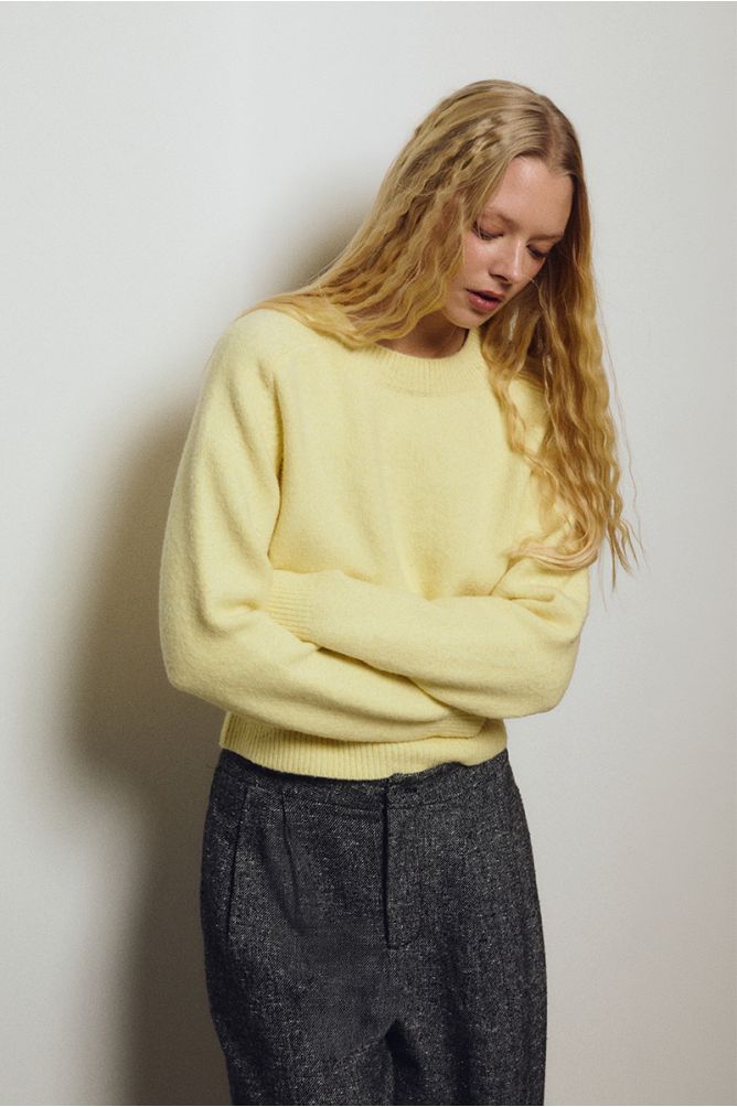 Molly Bracken women’s yellow cropped jumper styled with grey trousers