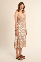 Molly Bracken beige chain print midi skirt front view on model