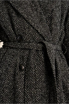 Molly Bracken charcoal herringbone coat belt and button detail close-up
