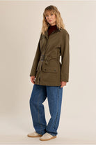 Molly Bracken khaki cotton parka jacket styled with blue jeans