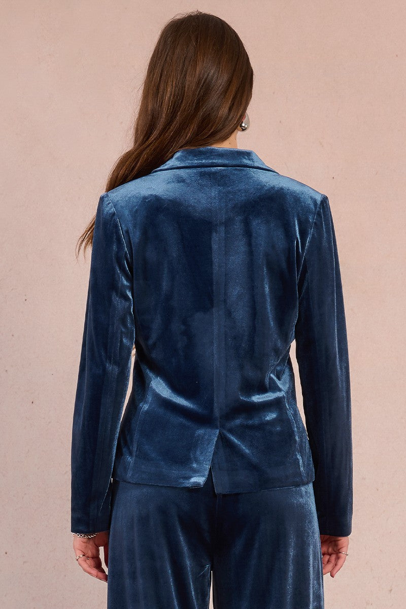 Back view of Molly Bracken straight cut velvet blazer in blue with smooth tailored finish