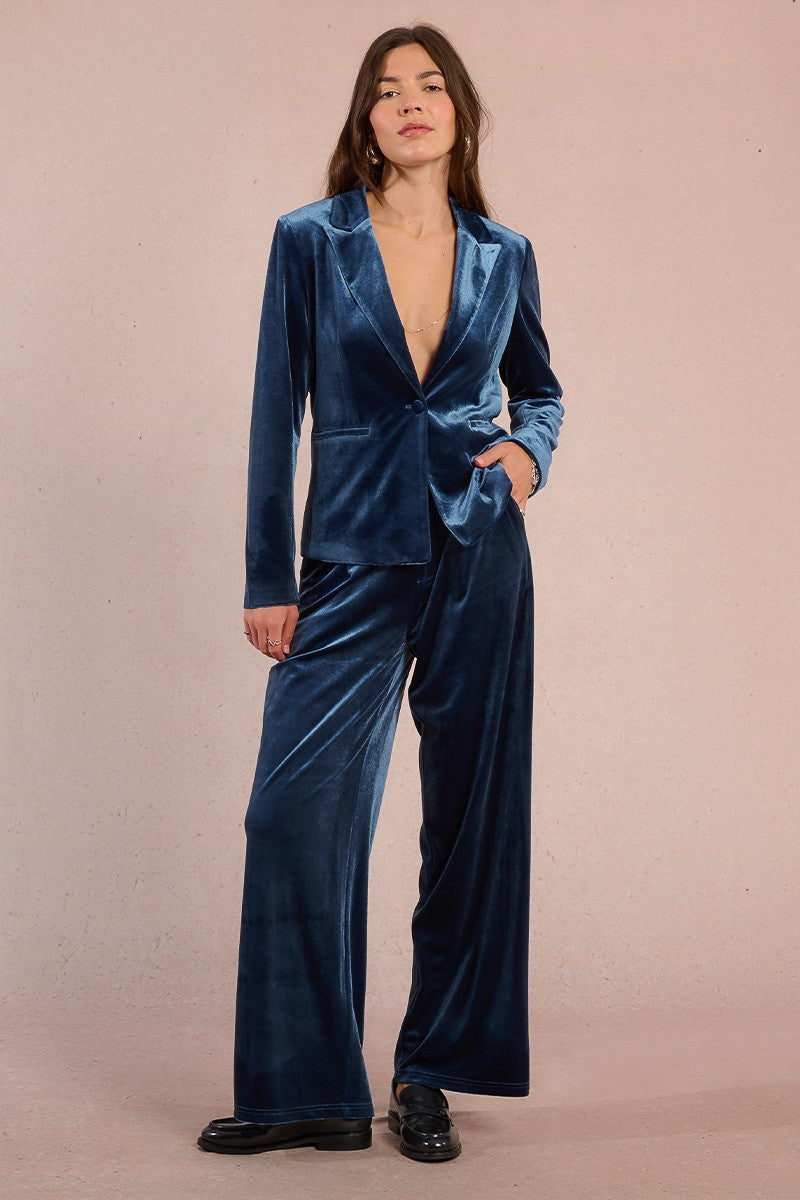 Molly Bracken straight cut velvet blazer in blue with wide lapels and single button closure, styled with matching velvet trousers