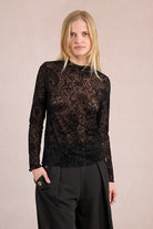 Front view of Molly Bracken black sheer paisley mesh top with velvet-effect flocking.