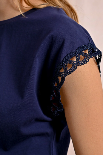 Close-up of crochet-trimmed sleeve on Molly Bracken navy cotton T-shirt.