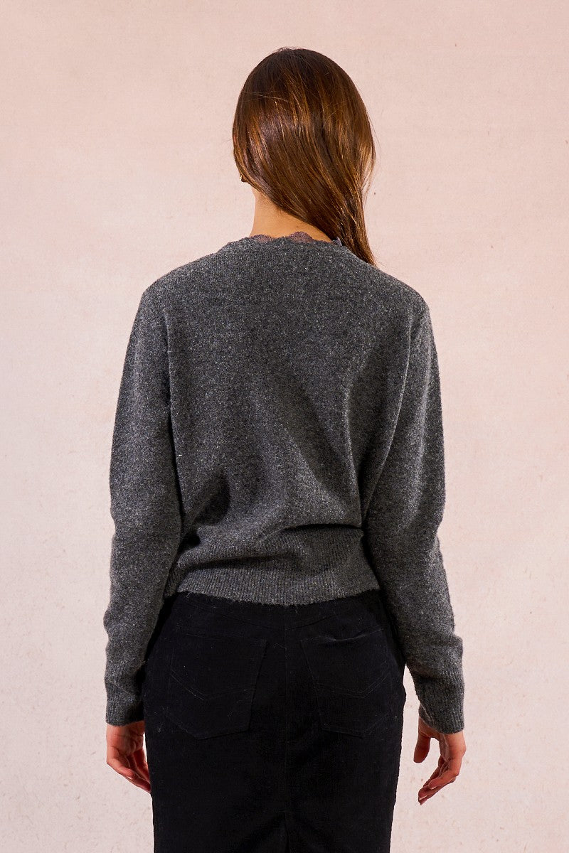 Back view of Molly Bracken charcoal grey scalloped knit cardigan in soft fine knit.