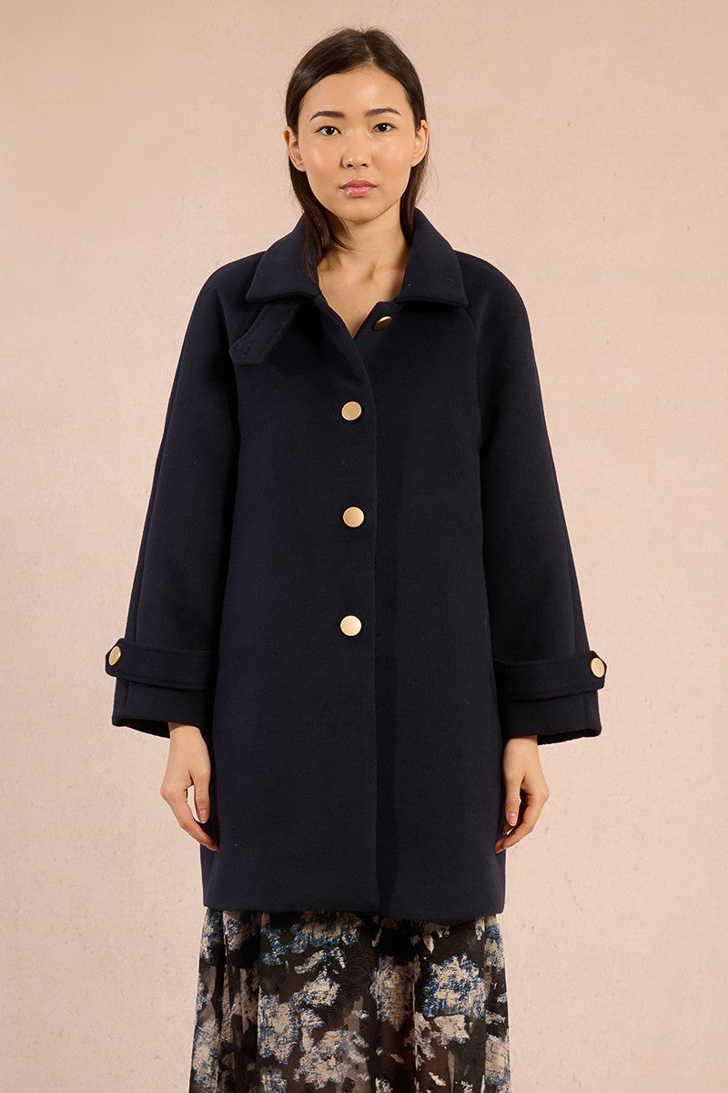 Molly Bracken navy long coat with large gold buttons