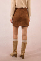 Back view of Molly Bracken camel faux suede high-waist mini skirt with seam detailing.