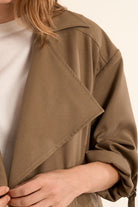 Molly Bracken trench style jacket with rolled sleeves and pocket detail