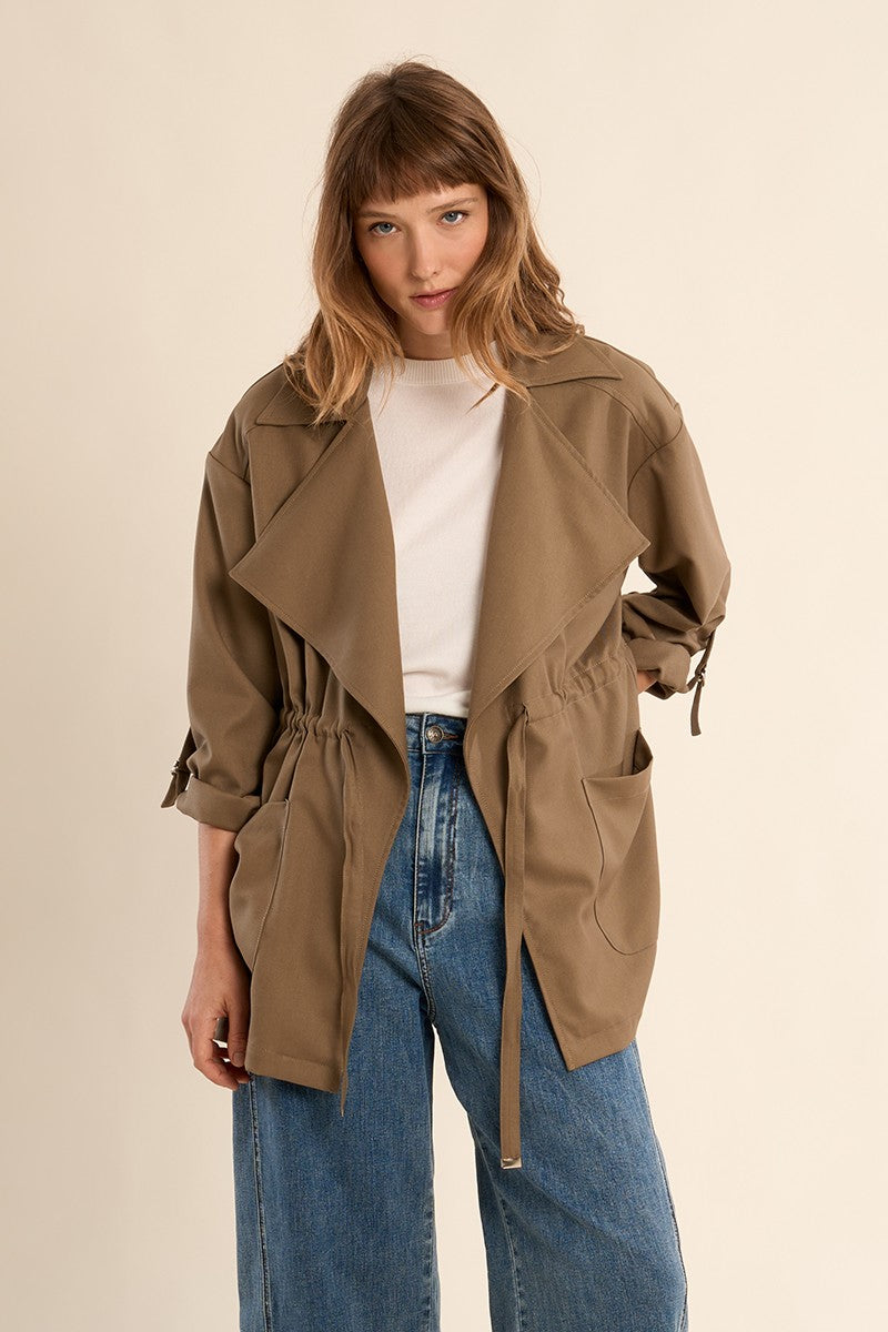 Molly Bracken women’s khaki trench jacket styled with denim