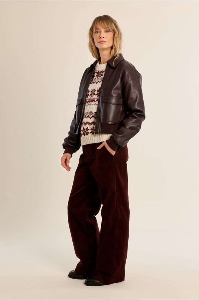 Molly Bracken women’s brown faux leather bomber jacket styled on model