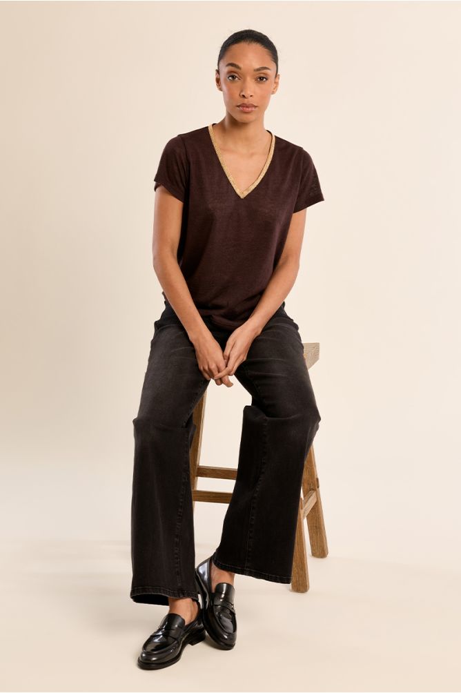 Molly Bracken brown V-neck T-shirt styled with black trousers