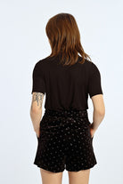 Molly Bracken Black High Waisted Belted Velvet Shorts From The Back 