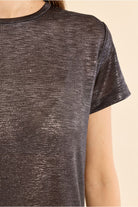 Molly Bracken pewter metallic T-shirt styled with black trousers