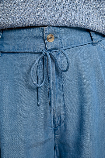 Lightweight blue summer shorts with tie waist and loose silhouette