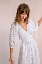 Romantic broderie anglaise summer dress with ¾ sleeves and ruffle hem
