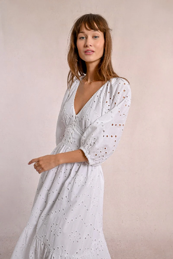 Elegant white cotton midi dress with full skirt and lace detailing