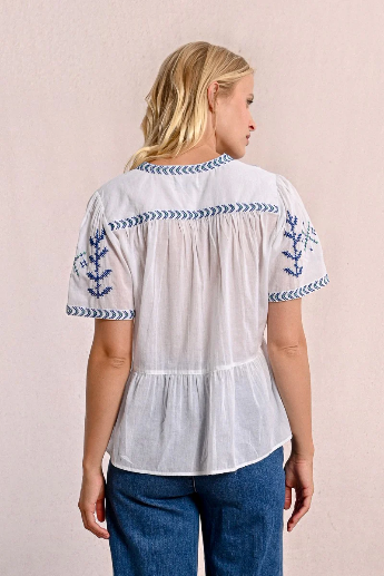 Back view of Molly Bracken cotton top showing soft gathers and sleeve embroidery.