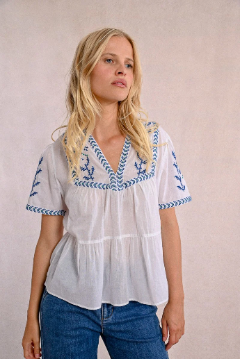 Front view of Molly Bracken embroidered white cotton poplin top with blue detailing.