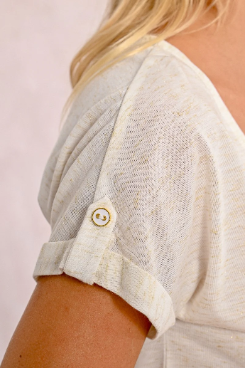 Close-up of lace embroidery on the back of off-white Molly Bracken T-shirt