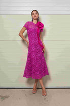 Moskada Zahara floral lace midi length occasion dress in pink with statement shoulder detail