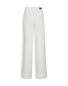 Back of Mos Mosh trousers in soft white lyocell shown in flat lay