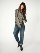 Model wearing Mos Mosh Abina Floro green floral shirt with relaxed fit