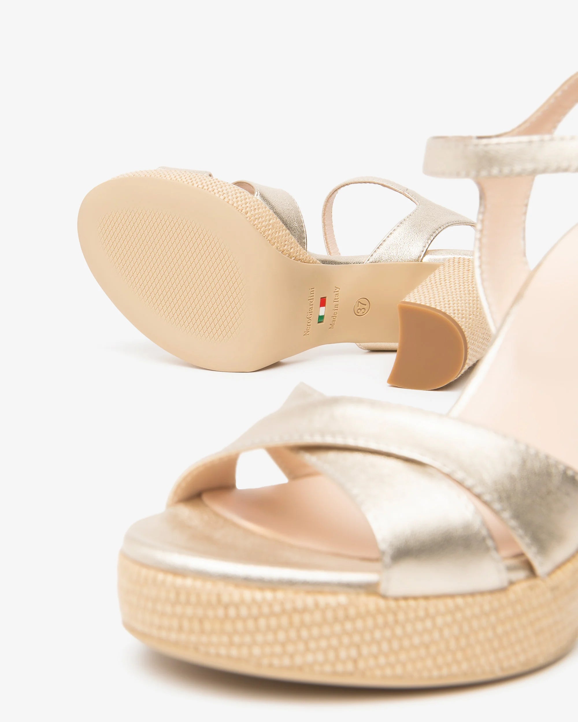 Nero Giardini gold heeled sandals sole and front strap detail platform sandal