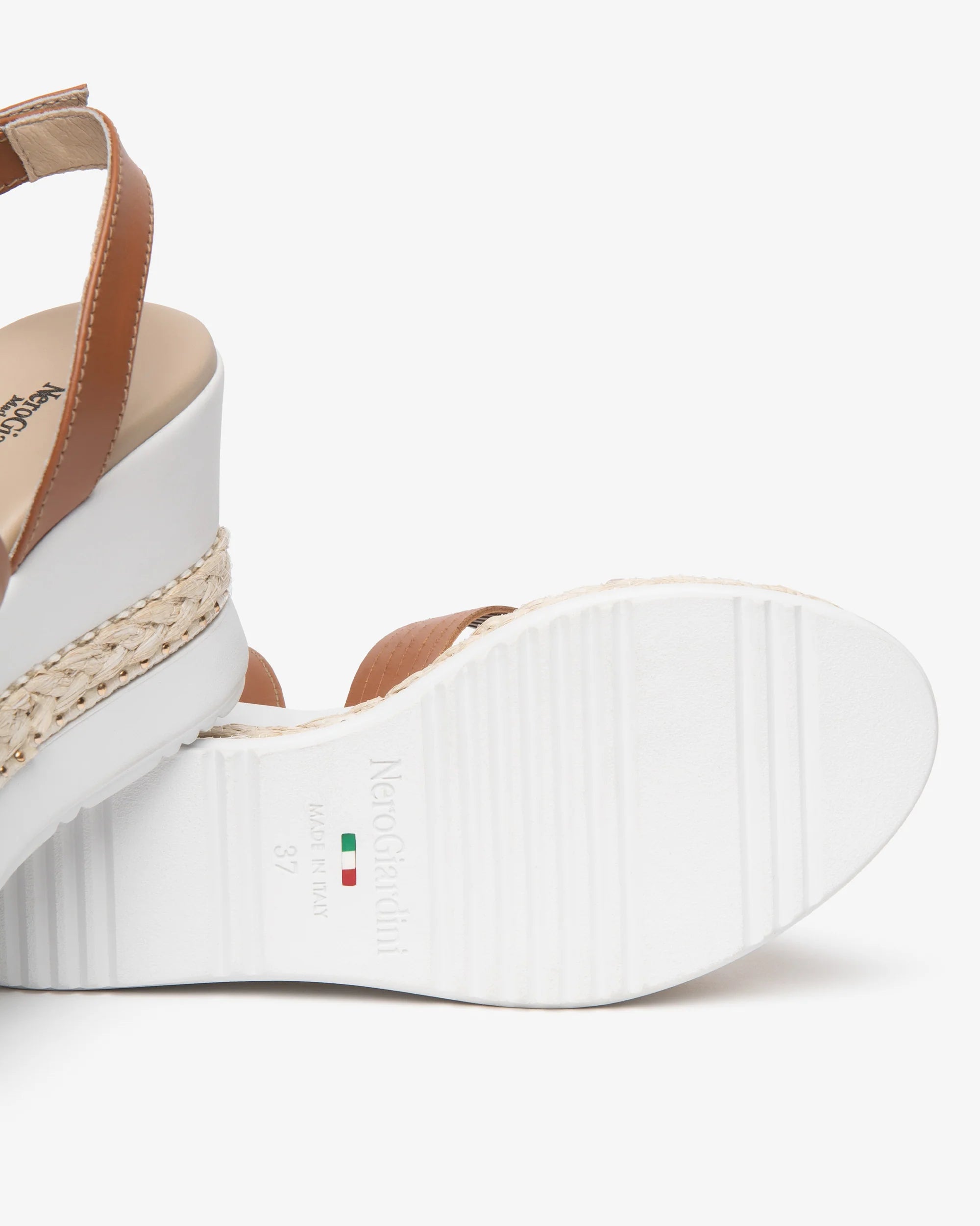Nero Giardini wedge sandals sole detail with tan leather straps