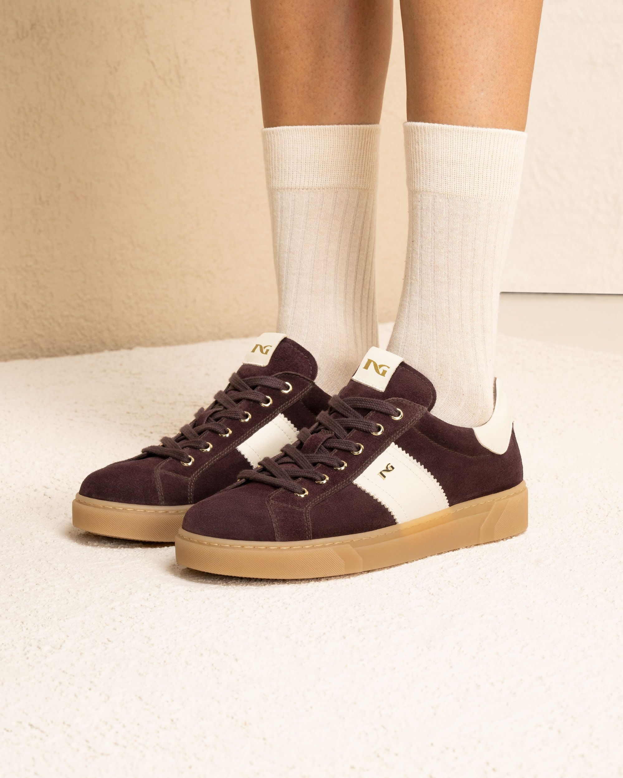 NeroGiardini sporty Burgandy and beige trainers styled with socks – on model