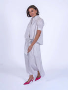 New Day Originals  Paddington blouse lace white and silver with high low hem 