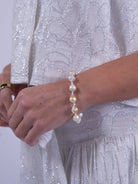 New Day Originals  Paddington white blouse styled with matching skirt silver thread