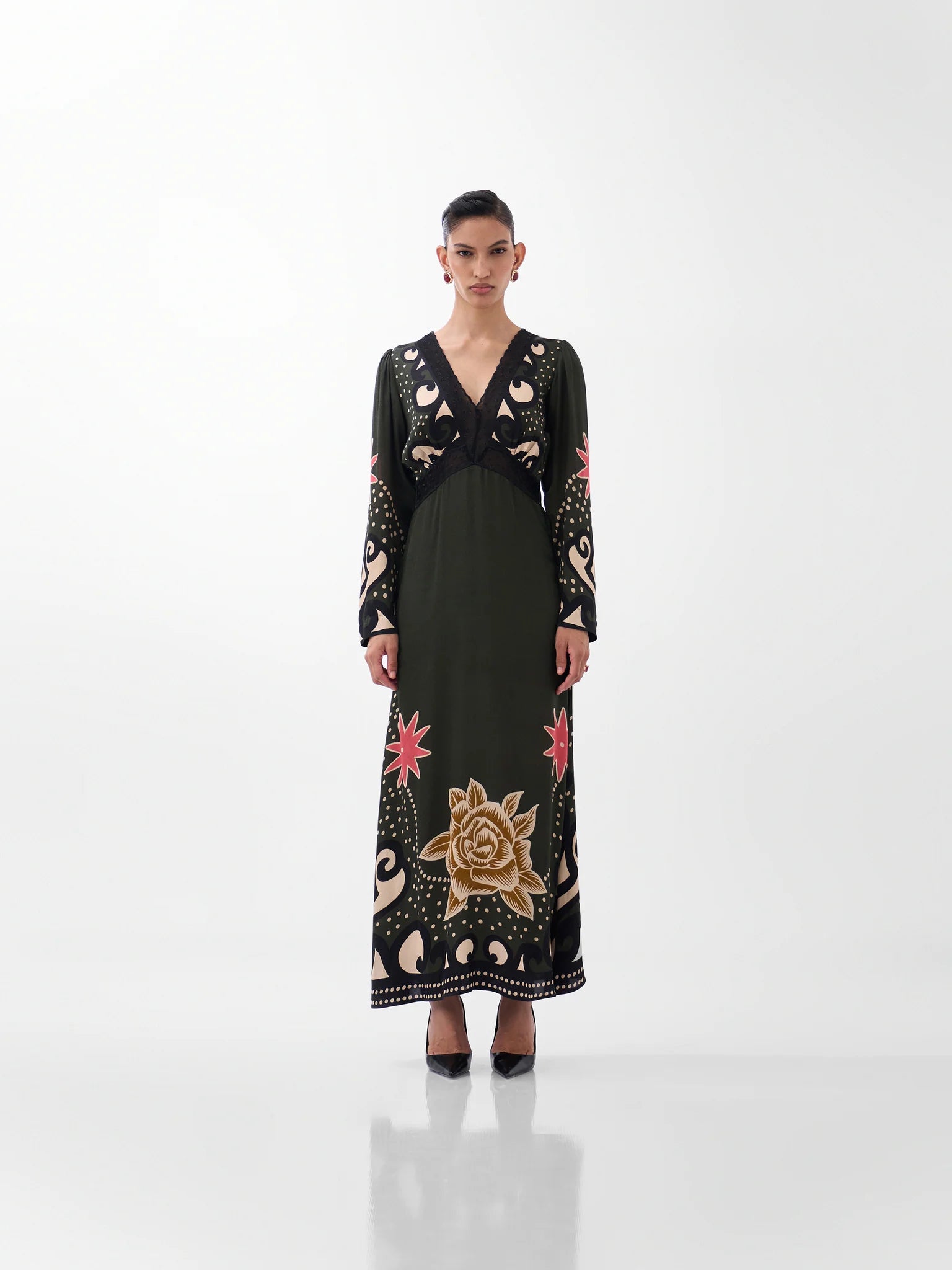 NOIB Aura Nocturnal Jungle green and black printed maxi dress with long sleeves – front model view.