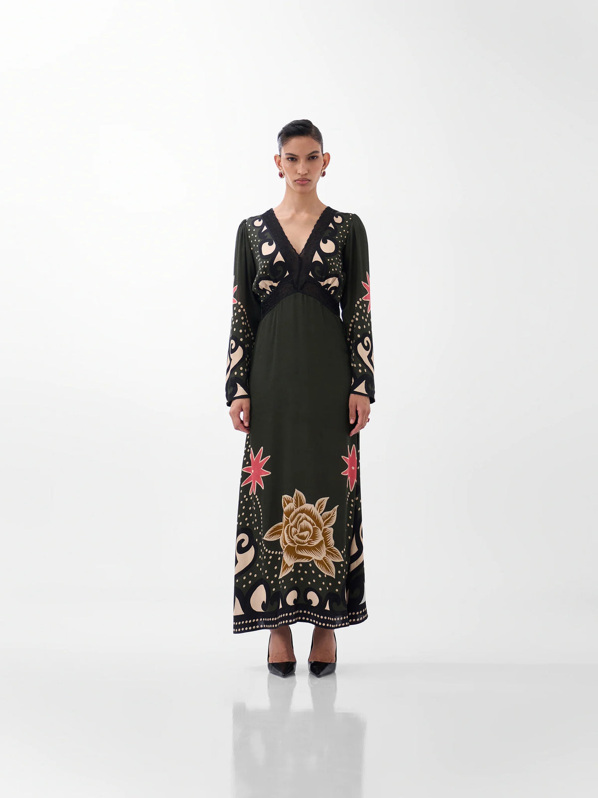 NOIB Aura Nocturnal Jungle green and black printed maxi dress with long sleeves – front model view.