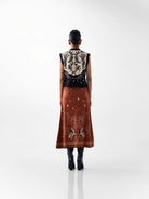 NOIB Lola black and ivory patterned knitted waistcoat with tropical back design – rear outfit view.