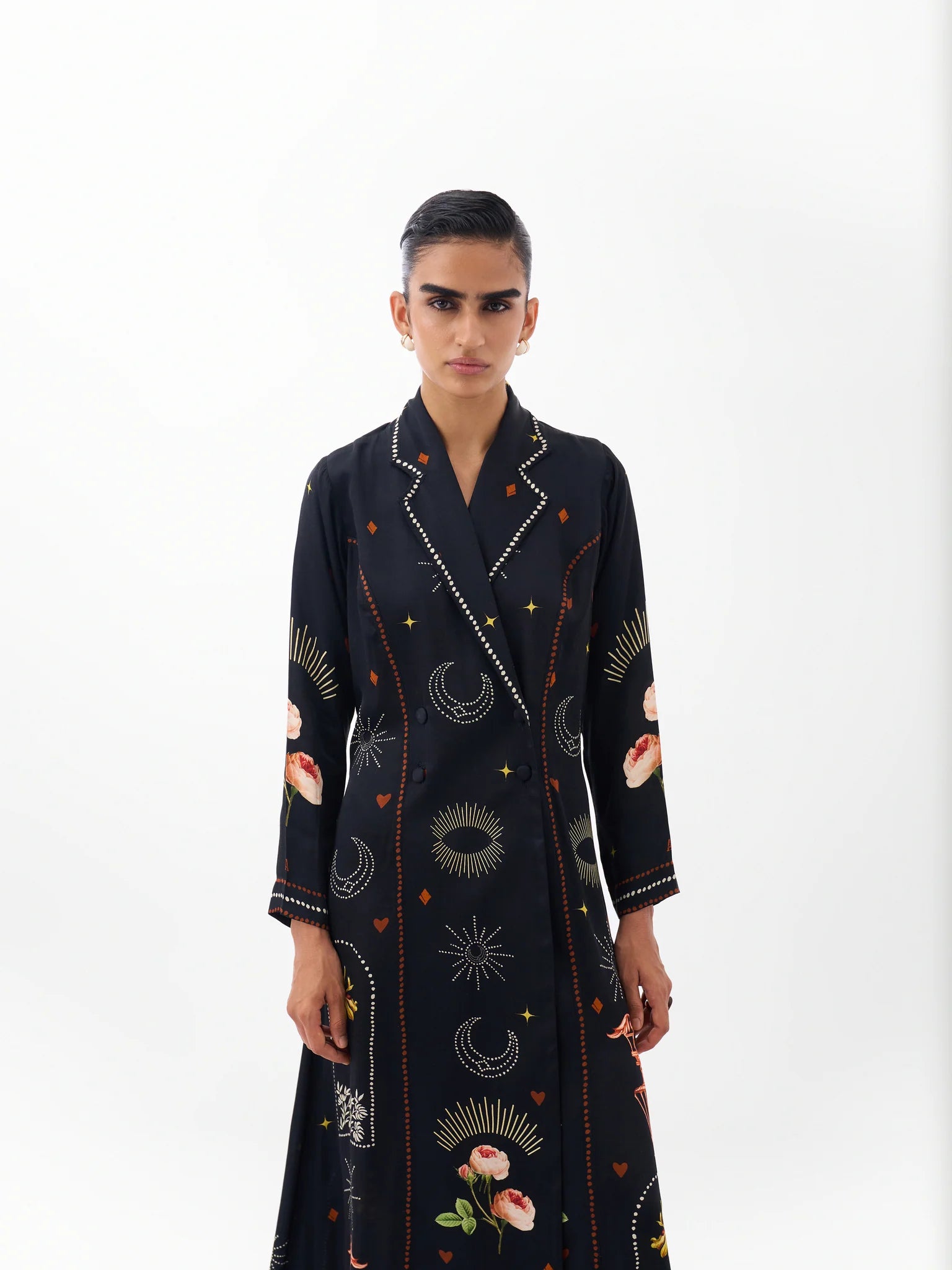 NOIB Willow black printed blazer dress with contrasting lapels and decorative motifs – upper-body model view