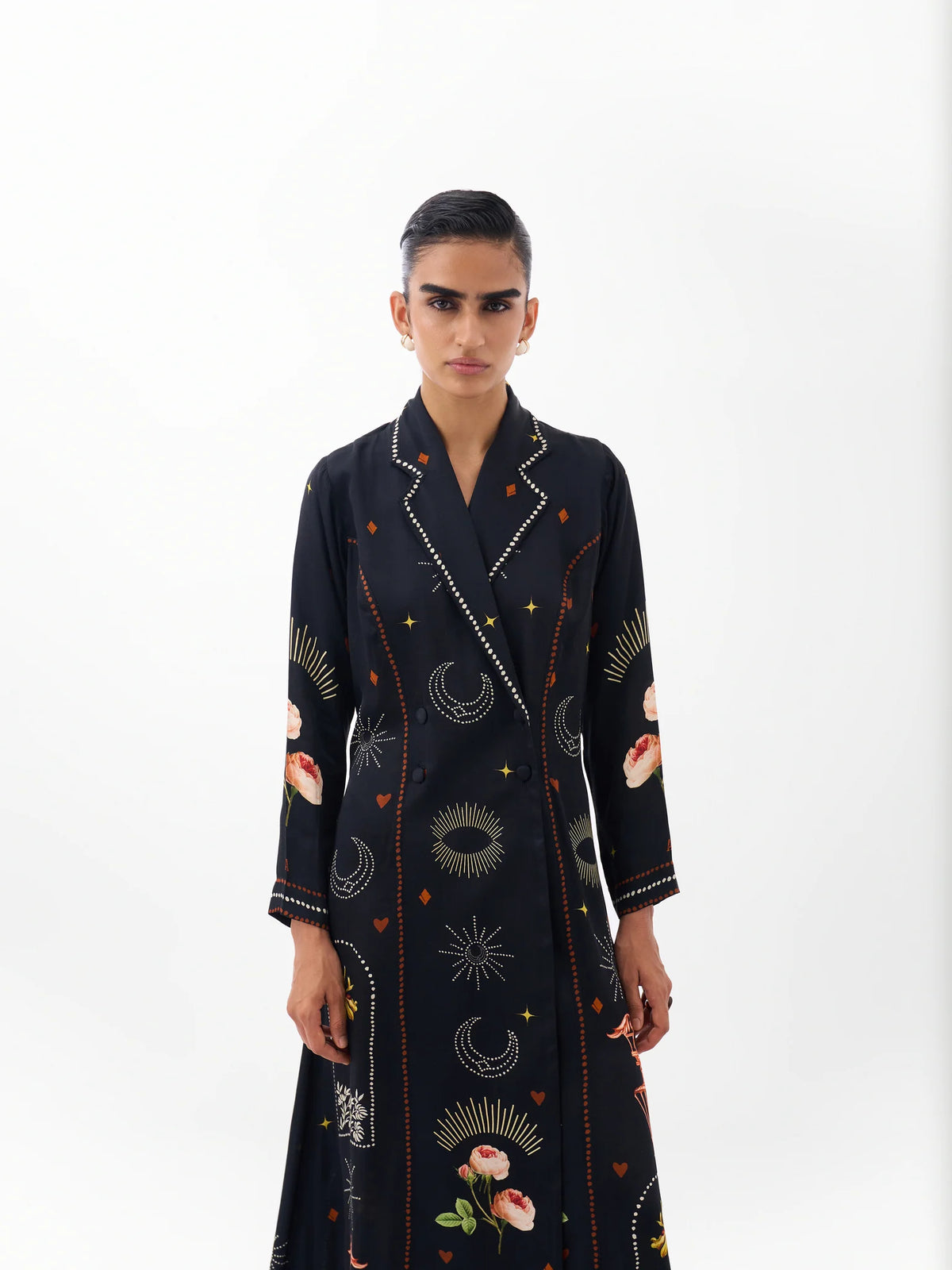 NOIB Willow black printed blazer dress with contrasting lapels and decorative motifs – upper-body model view