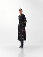 NOIB Willow long black botanical print blazer dress with long sleeves – three-quarter model view
