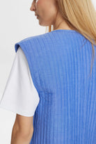 Back of Numph Nujodie gilet showing floral textured quilting and collarless neckline