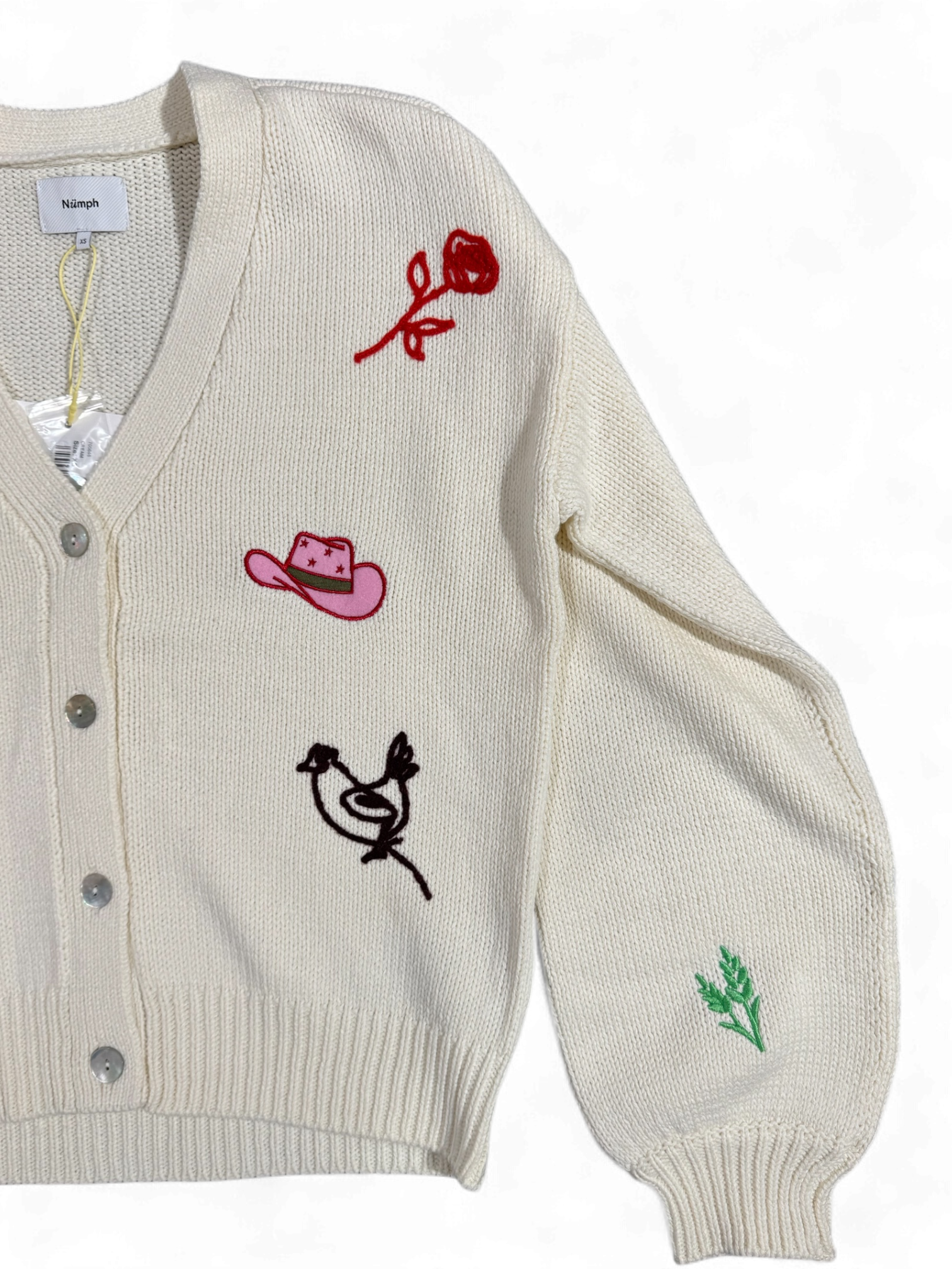 Whimsical embroidered cream cardigan by Numph with colourful playful details