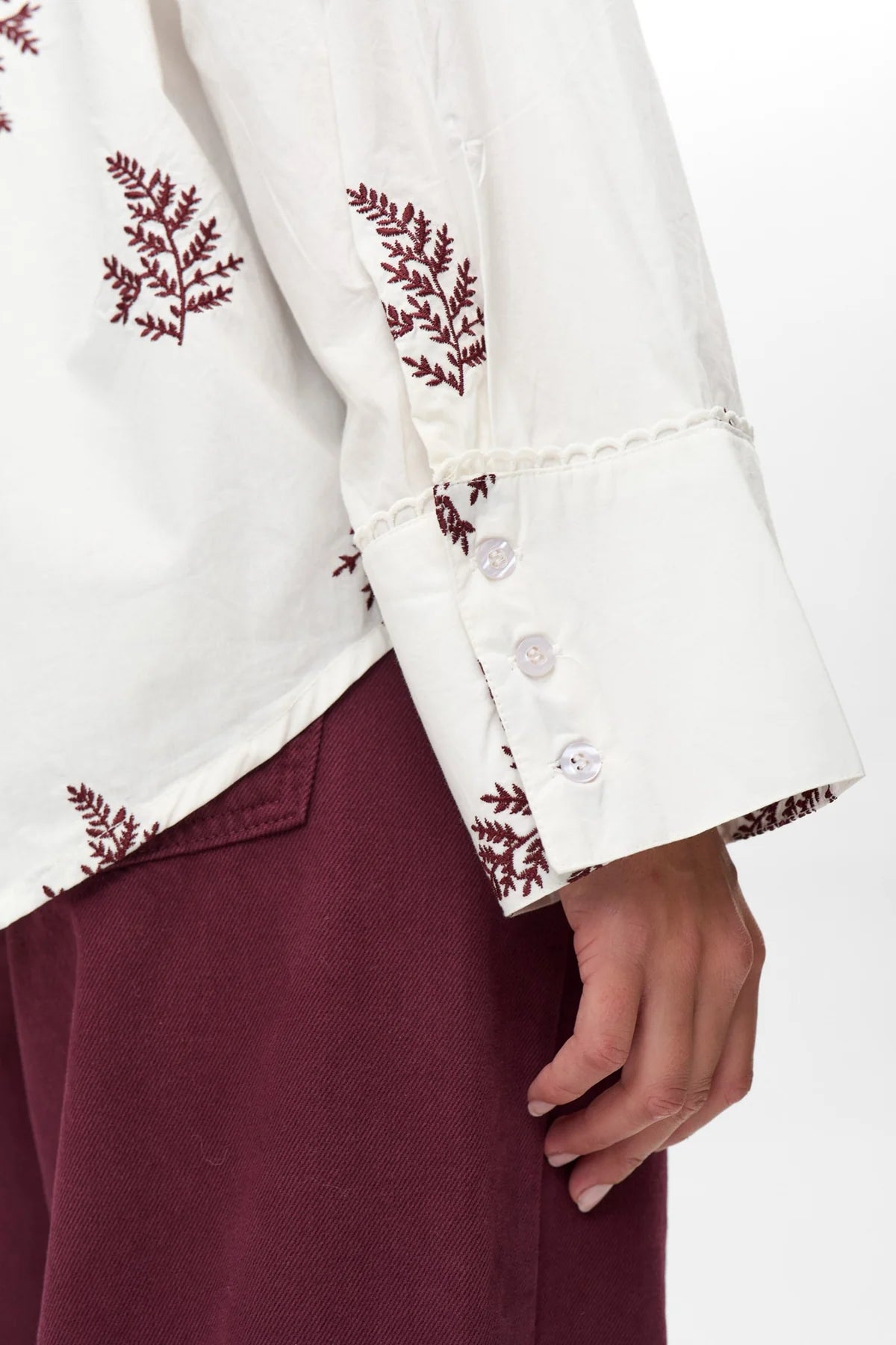 Numph Nubaily embroidered shirt – sleeve and buttoned cuff close-up
