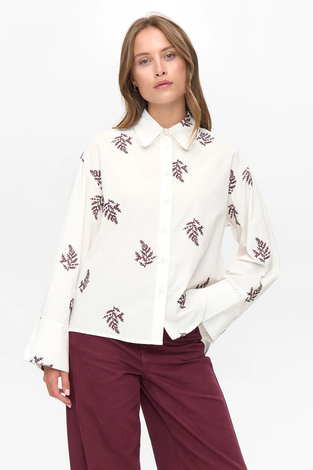 Numph Nubaily white shirt with burgundy embroidery – front view on model