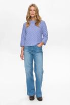 Numph Nuriette pointelle jumper styled with jeans blue
