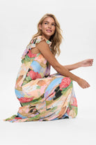 Numph fairytale print dress side view flowing skirt