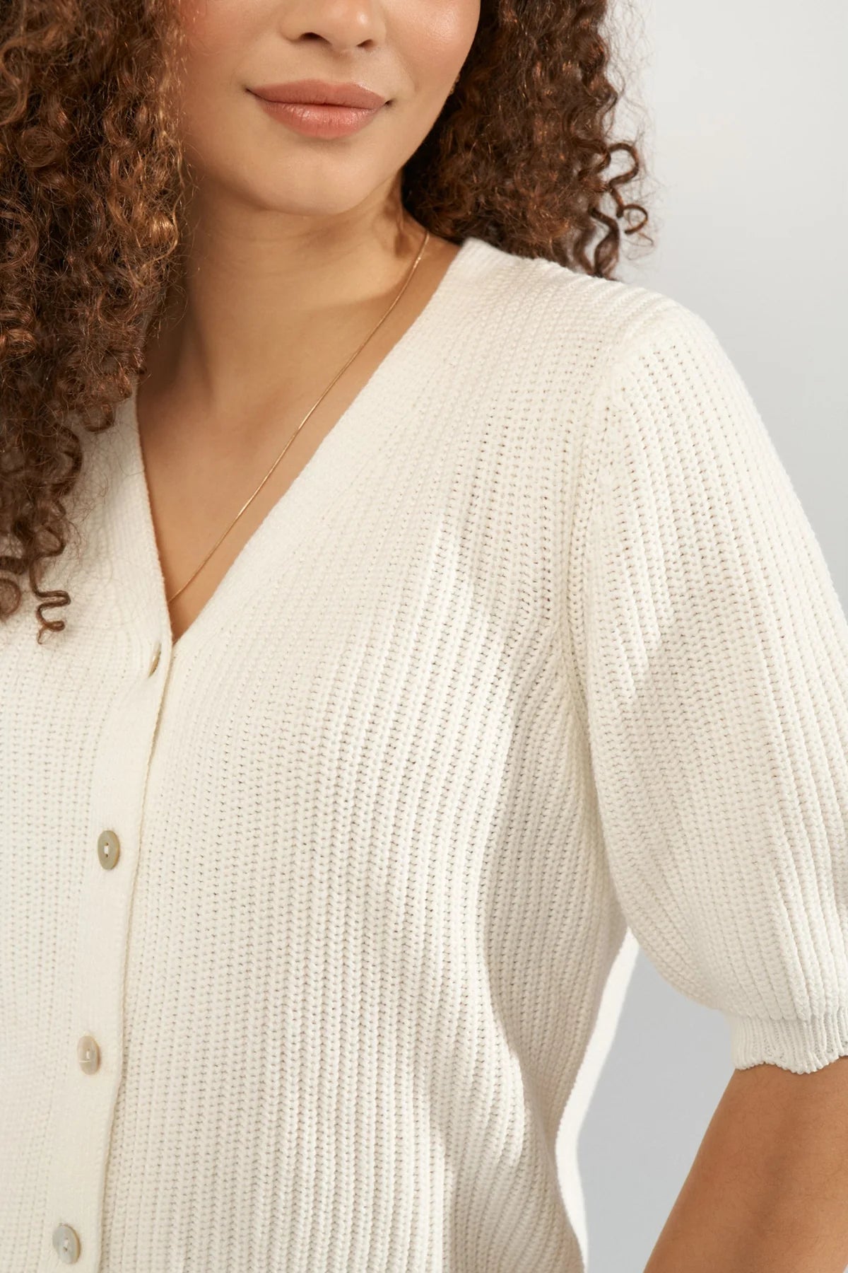 Numph cream V-neck cardigan ribbed knit detail close up
