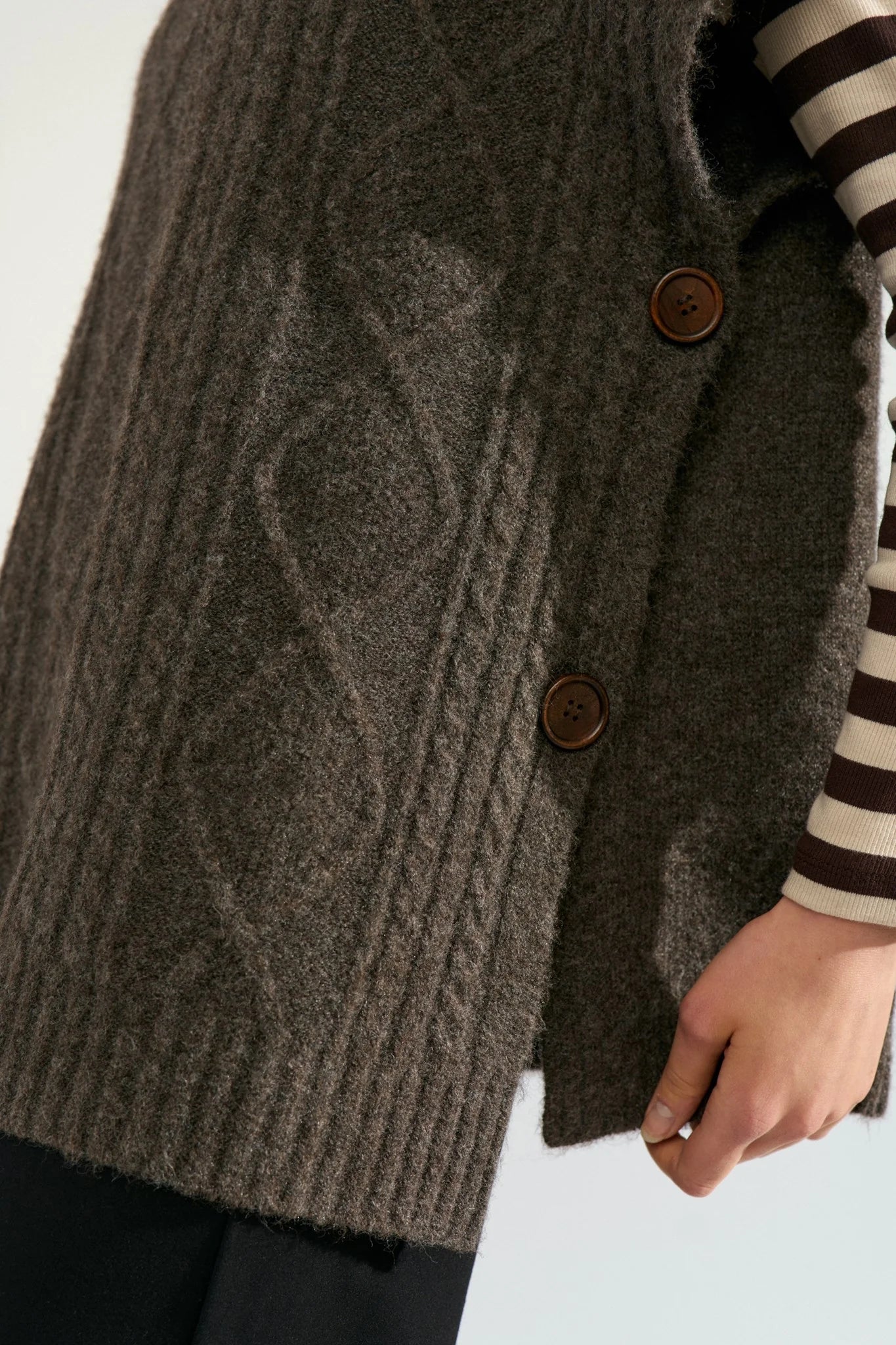 Nümph Nujoline Black Coffee poncho with cable knit panel and side buttons – detail view
